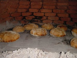 Cooking bread the traditional way.